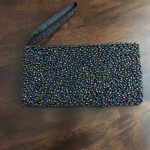 Beautiful metallic beaded clutch/wristlet!